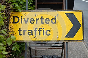 Detailed view of a typical, UK Diversion End sign seen located by a road junction. photo