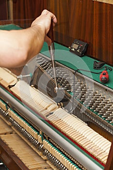 Detailed view of Upright Piano during a tuning