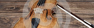Detailed view on a viola and a bow
