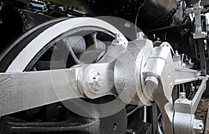 Detailed view of the wheel and piston Linkages on a US steam locomotive.