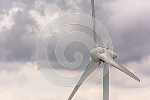 Detailed view of a wind turbine on top of mountains