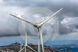 Detailed view of a wind turbines on top of mountains