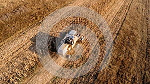 Details and aerial view of combine harvesting