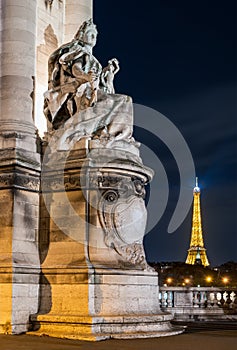 Details of Alexander III bridge in Paris at night