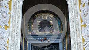 Details of arched main entrance to Cathedral. Concept. Beautiful detailed entrance with arched vault and iconostasis in