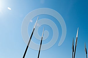 Details of the architecture - stylized spearheads that rest against the sky. Memorial sign at the site of an ancient battle. Histo