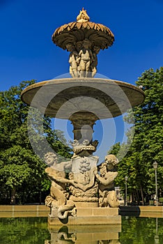 Details of the Artichoke Fountain or Fuente de la Alcachofa with Triton and Nereida in Buen Retiro Park, Madrid, Spain