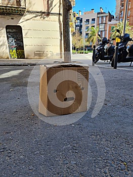 Box with a face in Barcelona, Spain. Travel and curiosities photo