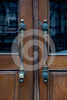 Details of classic architecture building entrance. Doorknob closeup