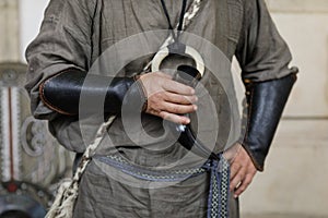 Details with the clothes and drinking horn of an ancient Dacian during a historic reenactment event