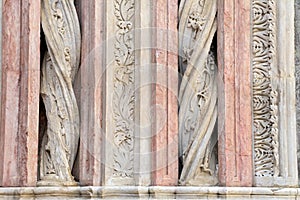 Details of the columns in marble on the facade of the Siena Baptistery