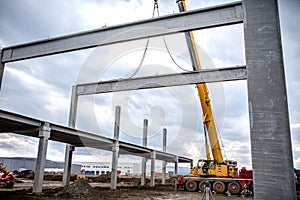 Close up details of construction site, industrial crane working in civil engineering