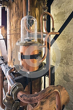 Details of copper tools used to distil schnapps. photo