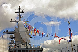 Details deck of the ship. The mast of the ship and signal flags.