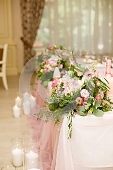 Details of decoration of Groom`s and Bride`s wedding table on wedding party