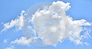 Cloud formations in the blue sky photo