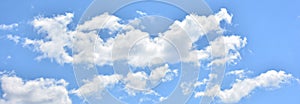 Cloud formations in the blue sky photo