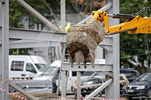 Details with a digger bucket on a construction site