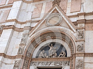 Details of facade of basilica di San Petronio on Piazza Maggiore in Bologna, Italy photo