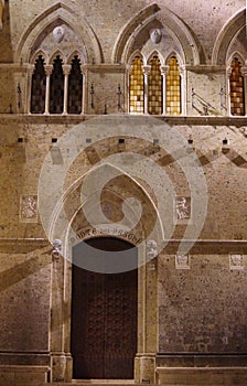 Details of the facade of Palazzo Salimbeni, Siena, Italy