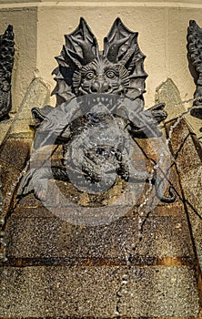 Details of the Fallen Angel Fountain or Fuente del Angel Caido in Buen Retiro Park in Madrid, Spain inaugurated in 1885 photo