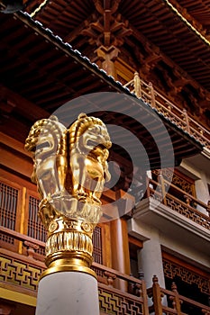 Details of golden Lions on Buddhist Jing An Tranquility Temple - Shanghai, China