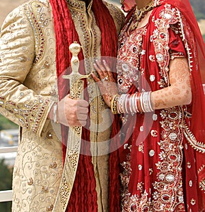 Details of groom`s and bride`s wear at the punjabi wedding,
