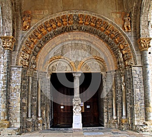 Door and tympanum of the Cathedral of Saint Mary of Oloron-Sainte-Marie, France. photo