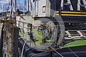 Details of a historic crane ship anchored in the port of the hanseatic city of Greifswald