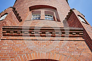 Details of a historic red brick water tower built around 1900 in Berlin