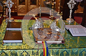 Details of holy cross and wedding crowns