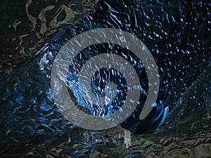 Details of ice in a blue ice cave in Iceland