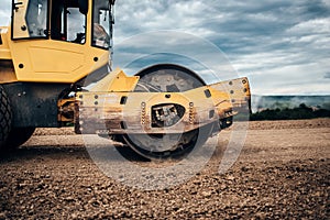 Details of industrial road soil compactor, vibratory roller and heavy duty machinery during highway construction