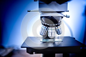 details of industrial scientific microscope used in medical, chemical and biochemistry fields photo