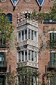 Details of interesting triangular decorated balconies in Barcelona, Spain