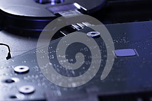 Details of an internal hard disk drivers. Close up. Data, hardware and information concept