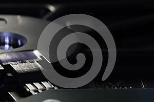 Details of an internal hard disk drivers. Close up. Data, hardware and information concept