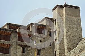 Details of Leh Palace, Ladakh, showing windows, balconies and a tower