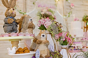 Details of luxurious table of sweets and birthday cake