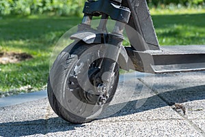 Details mechanism of used electric scooter close up.