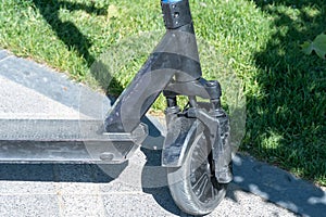 Details mechanism of used electric scooter close up. photo