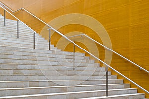 Details of metal railing and marble stairs of modern building