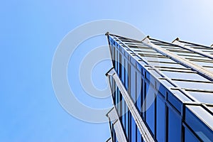 Details of office building exterior. Business buildings skyline looking up with blue sky. Modern architecture apartment. High tech