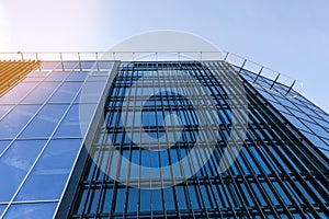 Details of office building exterior. Business buildings skyline looking up with blue sky. Modern architecture apartment. High tech