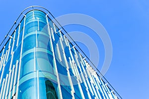 Details of office building exterior. Business buildings skyline looking up with blue sky. Modern architecture apartment. High tech