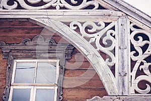Details of the old historical wooden architecture, Rakvere, Estonia. Traditional house with carved wooden details photo