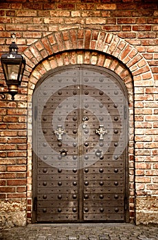 Details of old metal door at medieval fortress Akershus in Oslo