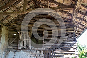 Details of an old wooden house, wooden barn structure, rural scene, interior of an abandoned house