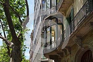 Details of the one of old buildings in modern style in the historical center of Barcelona