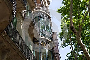 Details of the one of old buildings in modern style in the historical center of Barcelona in sunny day. Spain